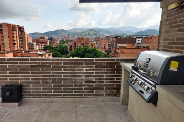 Área de BBQ equipada en la terraza común